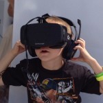 Boy_wearing_Oculus_Rift_HMD